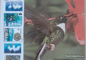 Classificador c/ 520 selos tema " Aves "