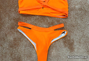 Bikini laranja, S