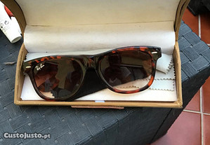 óculos de sol com caixa
